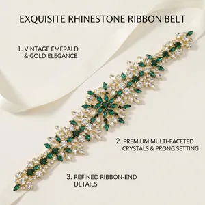 Detail of exquisite emerald green and clear rhinestone belt for bridal gown accessories.