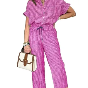 Chic fuchsia striped two-piece set for women featuring short sleeve shirt and pants.