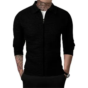 Men's stylish black waffle knit zip-up polo jacket with long sleeves and collar