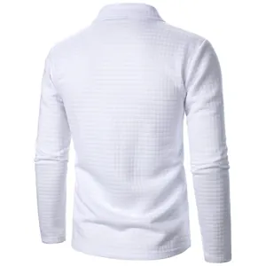 Macro texture detail of white waffle knit fabric on the back of a men's polo shirt
