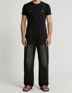 Vintage black denim bib overalls for men featuring adjustable straps and front pocket
