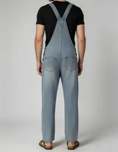 Detailed back view of men's vintage light blue denim overalls featuring dual rear pockets