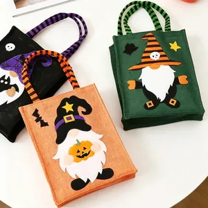 Set of three Halloween linen gift bags featuring cute cartoon gnome designs for candy.