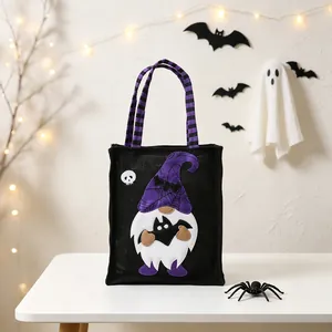Halloween burlap tote bag with cute purple gnome design and bat details for candy