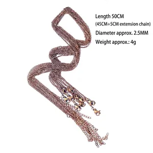 Macro detail of rose gold 2.5mm stainless steel O-link chains showing texture and clasps