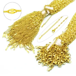 Bulk golden stainless steel DIY necklace chains with lobster clasps and extension tags.