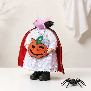 Headless Halloween doll decoration featuring a sequined dress and pumpkin ornament