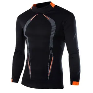 Men's black long-sleeve compression shirt with orange accents for fitness training