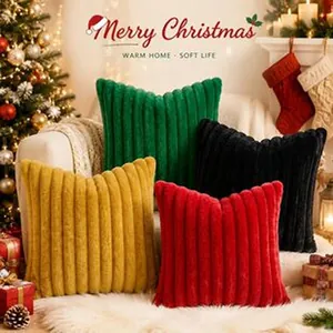 Detail view of colorful striped corduroy throw pillow covers in cozy Christmas setting