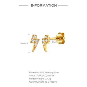 Detailed view of gold 925 sterling silver lightning bolt earrings with AAAAA zirconia