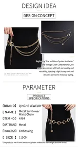 Detail view of adjustable multi-layer gold waist chain with sun and moon charms