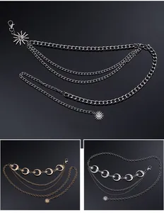 Close-up detail of multi-layer metal waist chain with sun and moon celestial charms