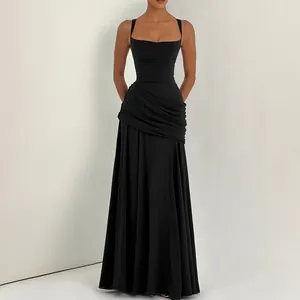 Elegant floor-length black spaghetti strap maxi dress with a ruched bodice detail