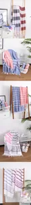 High-quality all-cotton Turkish beach towels with colorful stripes and decorative tassels