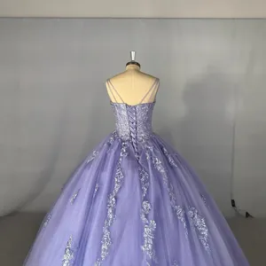Elegant purple ball gown with lace embroidery and sequins for proms and events.