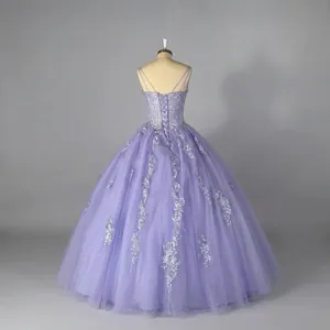 Elegant purple ball gown with lace embroidery and sequins for proms and events.