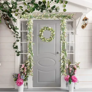 Ghirlanda di margherite artificiali e ghirlande floreali per decorare la porta d'ingresso