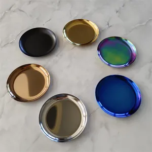 A collection of small circular metal storage trays in six different metallic finishes