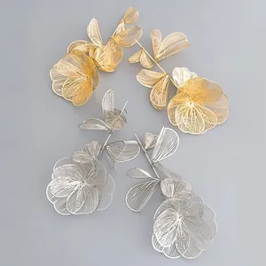 Elegant 3D hollow floral dangle earrings in gold and silver tones for modern women