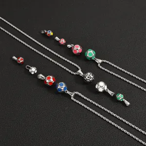 Detailed view of colorful stainless steel soccer ball pendants with vibrant enamel finish