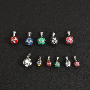 Variety of colorful enamel soccer ball pendants in different sizes on black background