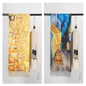 Detail showing artistic oil painting patterns and fine tassels on warm winter scarves