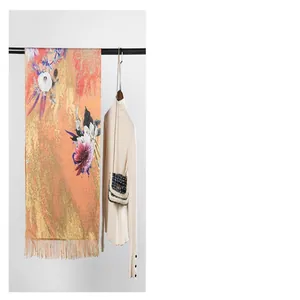 Detailed view of the vibrant oil painting floral pashmina scarf with fringe
