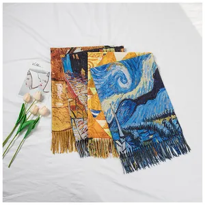 Detailed view of the oil painting print and fine tassel fringe on the scarf.