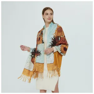 Detail of women's long shawl featuring Van Gogh sunflower oil painting print and tassels.