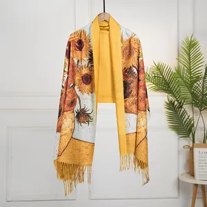 Macro view of oil painting sunflower pattern on long pashmina scarf with tassels