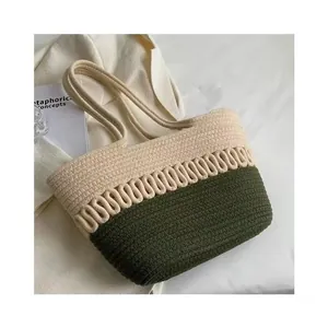 Detailed view of dual-tone cotton rope woven tote bag with wavy decorative pattern
