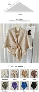 Elegant knitted triangular shawl with decorative fringe and multiple color choices.