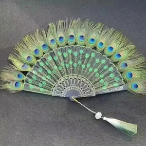 Elegant Chinese style peacock feather folding fan with green sequins and white tassel
