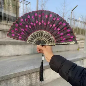 Elegant black folding fan featuring purple sequin embroidery and a decorative black tassel