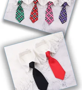 Detailed view of assorted pet necktie collars in various solid and checkered patterns