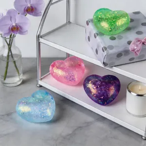 Colorful transparent heart-shaped glitter squeeze toys for stress relief and slow rebound