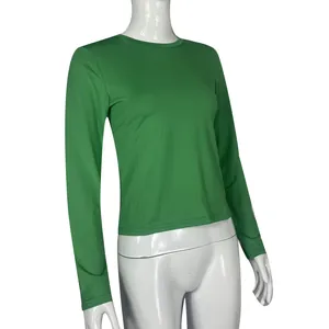 Close-up of women's slim fit green long-sleeve t-shirt on a white mannequin