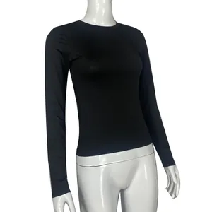 A high-quality detailed view of a black slim-fit long-sleeve T-shirt on a white mannequin