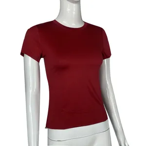 Detailed side view of a slim fit burgundy short sleeve t-shirt on a white mannequin