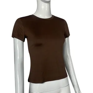 Side-front detail of a slim-fit brown short-sleeve crew neck t-shirt on a mannequin