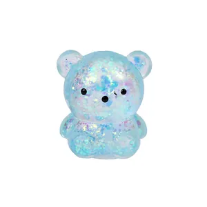 Cute glitter blue bear squishy stress relief toy with sparkling sequins on white background