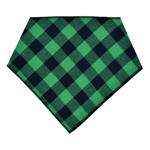 Detailed view of the green and black buffalo plaid fabric on a triangle pet bandana