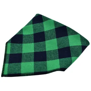 Close-up view of the classic green and black plaid pet bandana showing fabric texture
