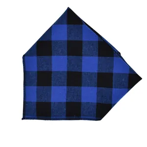 Detailed view of a blue and black buffalo plaid pet bandana with a triangular cut