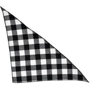 Detailed view of the classic black and white buffalo plaid pattern on pet bandana