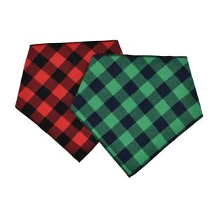 Detailed view of classic red and green buffalo plaid pet bandanas with stitched edges.