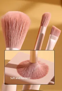 Macro detail of high-quality soft pink makeup brush bristles showing flexibility and density