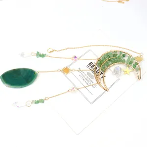 Bohemian golden moon suncatcher with green agate slice and crystal prism window decor