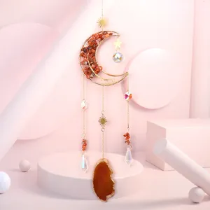 Golden crescent moon suncatcher with raw stones, crystal prisms and agate slice detail.