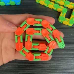 24-section snap and click fidget toy for stress relief and puzzle fun in green and orange